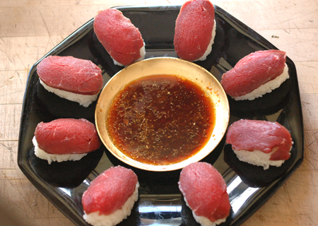 Venison sushi, my new favorite way to eat venison. The meat is previously frozen, which should take care of parasites. I'll be cleaning my deer more carefully next year to maximize sashimi potential. I'm making some for lunch in a few minutes, yum.